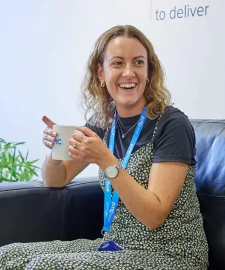 PMC employee having coffee