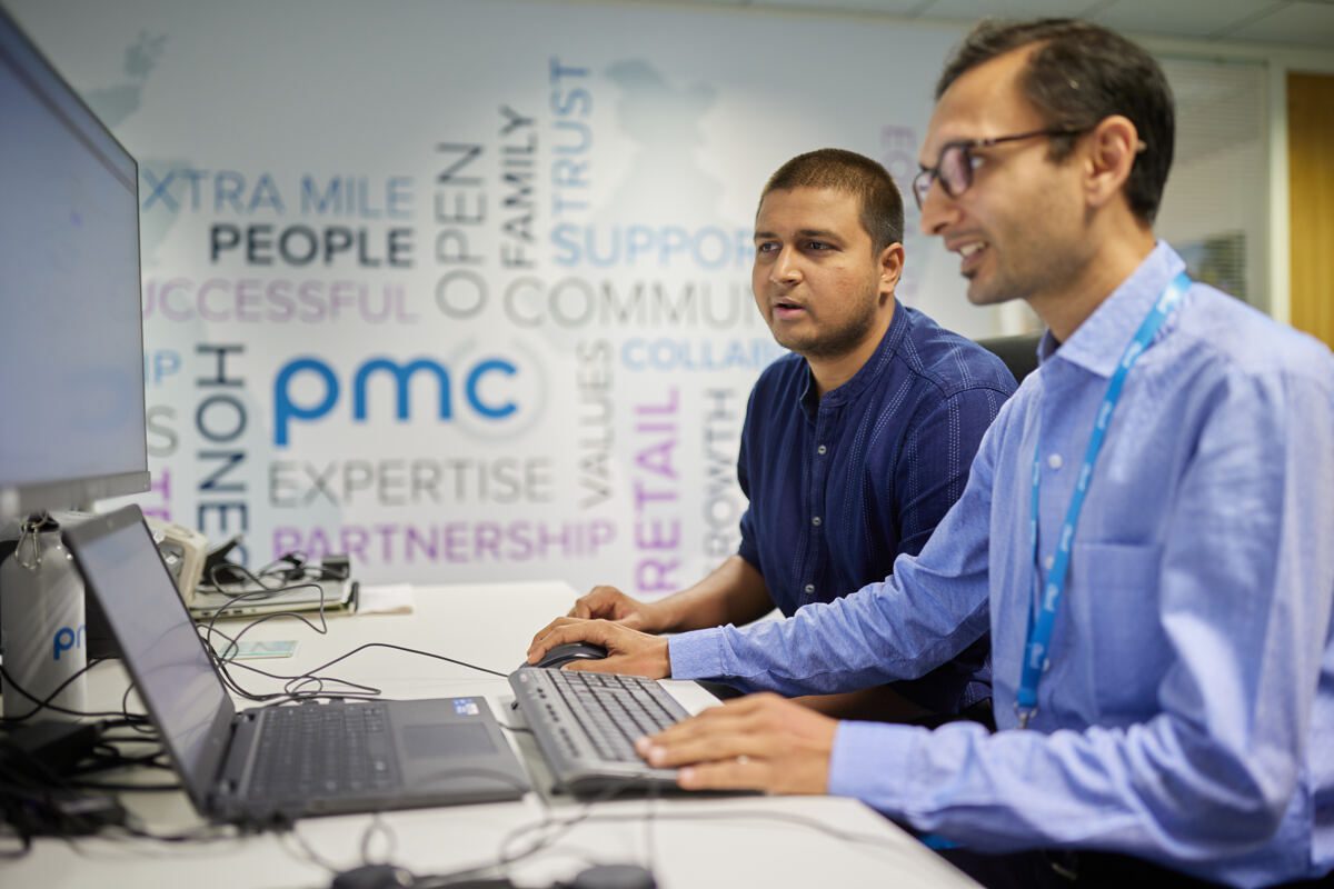 PMC employees working together
